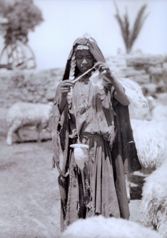 Israel, Sharon, Bedouin shepherdess spinning