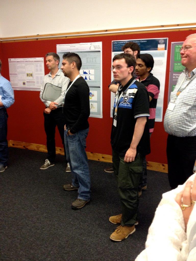 Listening to poster presentations5