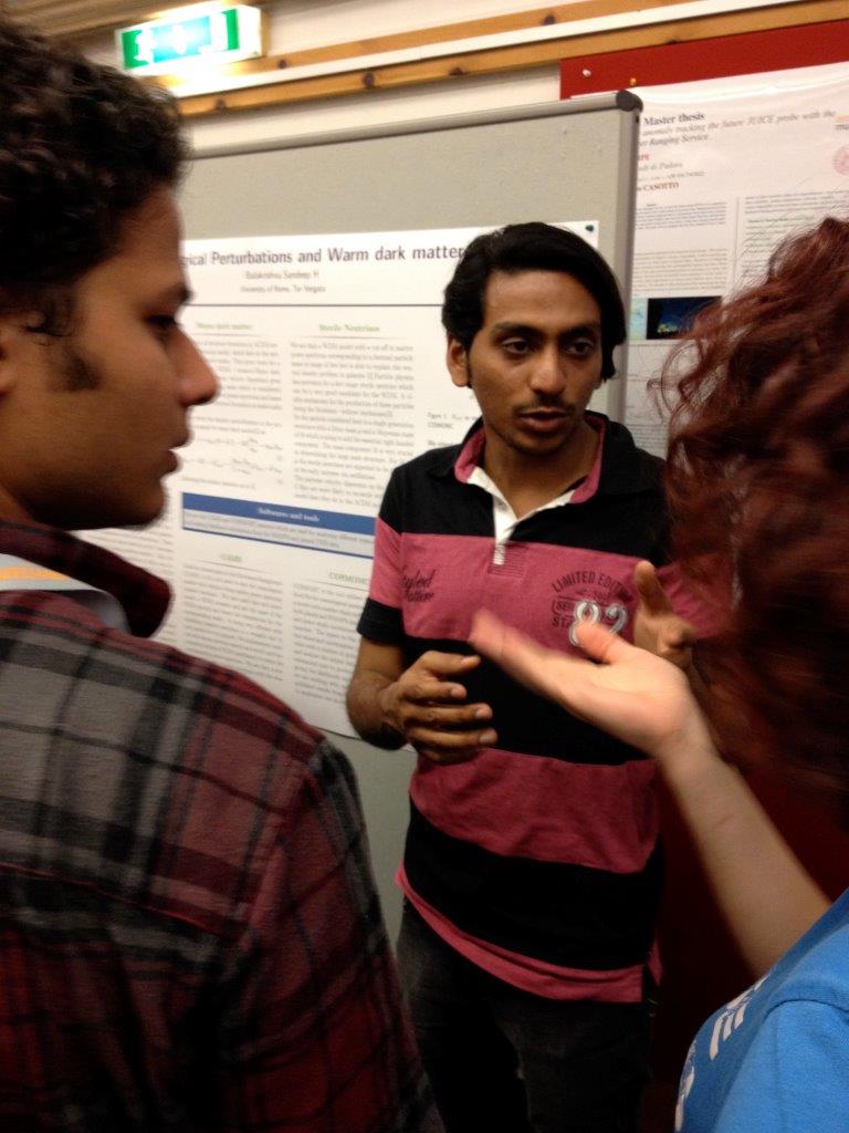 Students discussing posters