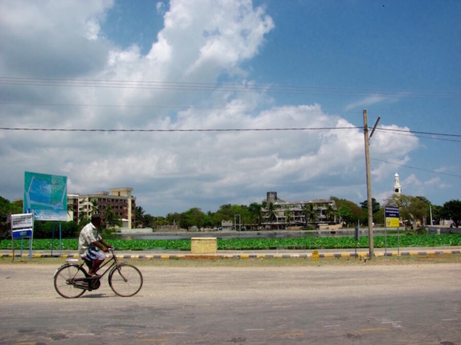 Man biking in Jaffna, Sri Lanka, where Rina conducted her PhD research. Photo copyright: Rina Alluri