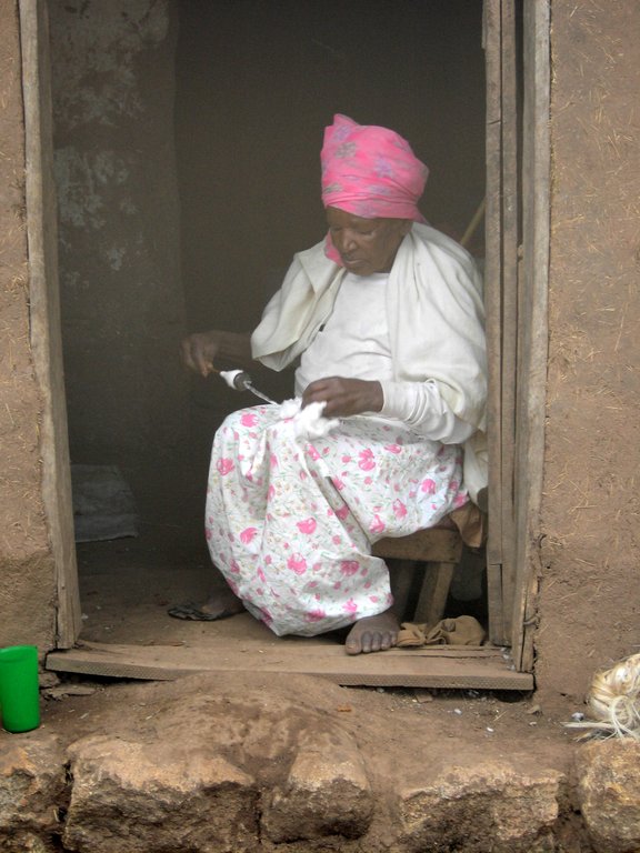 Ethiopia, Dorze woman spinning