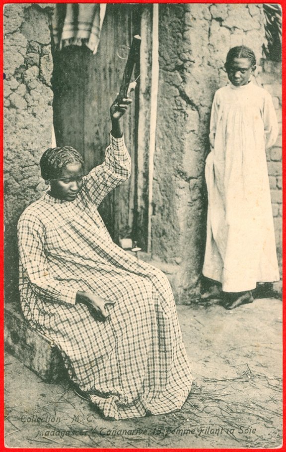 Madagascar, woman spinning silk