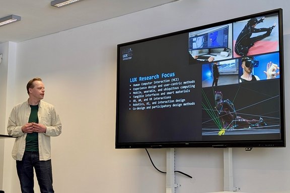 Timo Luukkonen giving a presentation