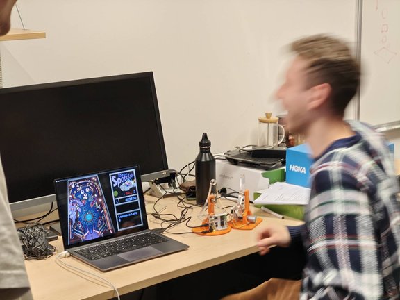 Student testing haptic game pinball