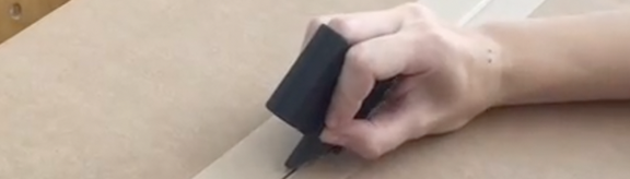 Fingerhut mit integriertem Cuttermesser