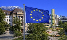 The image is a montage of the university buildings of the Universities of Innsbruck and Duisburg-Essen, with a large EU flag visible in the foreground.