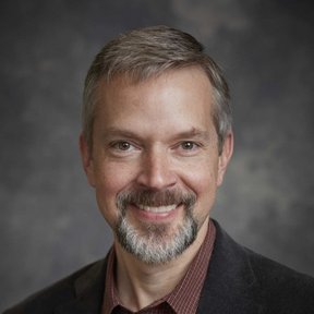 Ein Portraitfoto von Clint Peinhardt