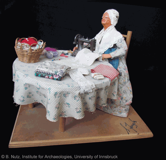 Näherin an der Nähmaschine