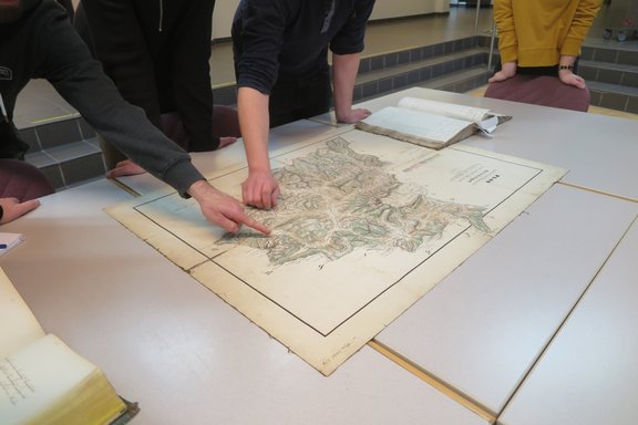 Discussion of a historical map and the plotted forest use areas.