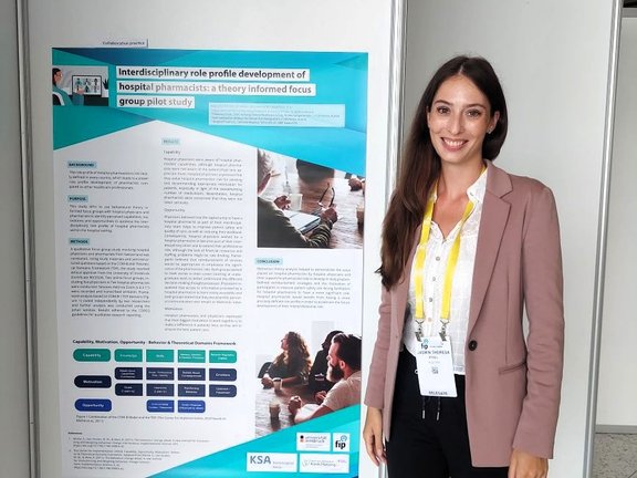 Jasmine at her poster