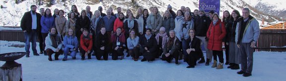 EALTA Winter School participants group picture in front of snowy mountain