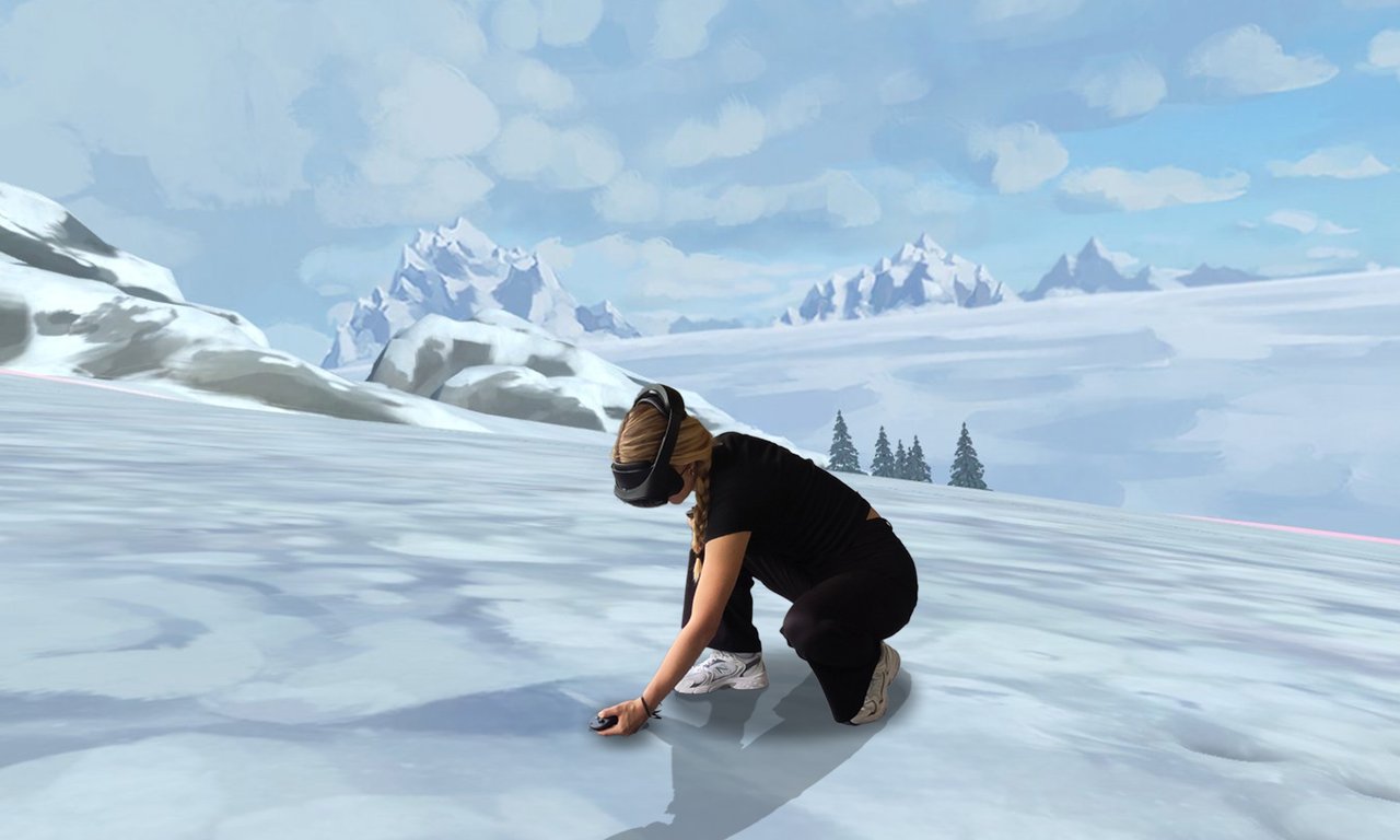 Eine Person mit VR-Brille am Kopf kniend in einer virtuellen Winterlandschaft.