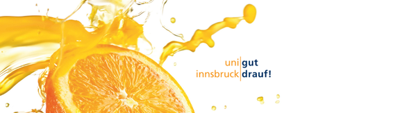 Orange mit Orangensaftspritzern