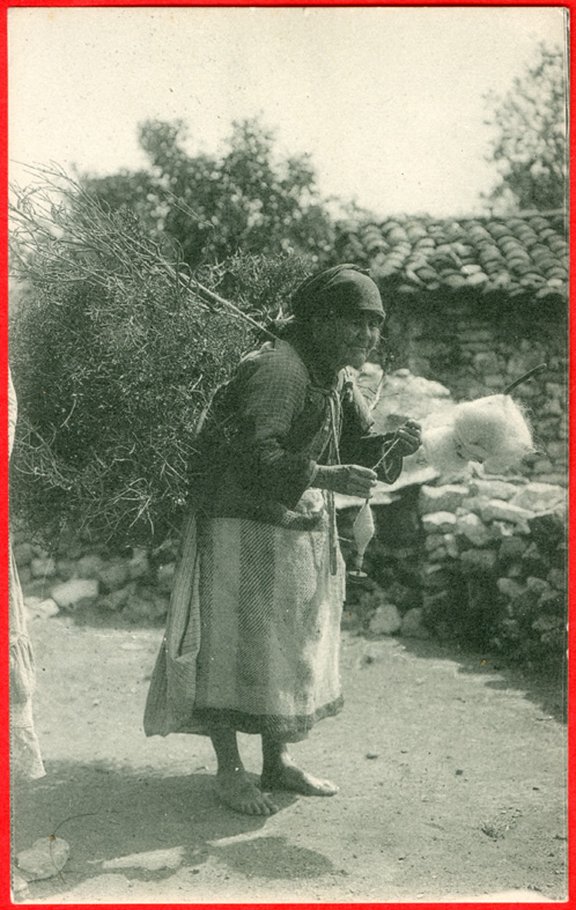 Greece, old woman spinning