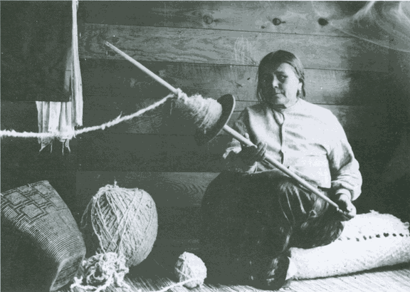 Canada, Salish woman spinning, 1915