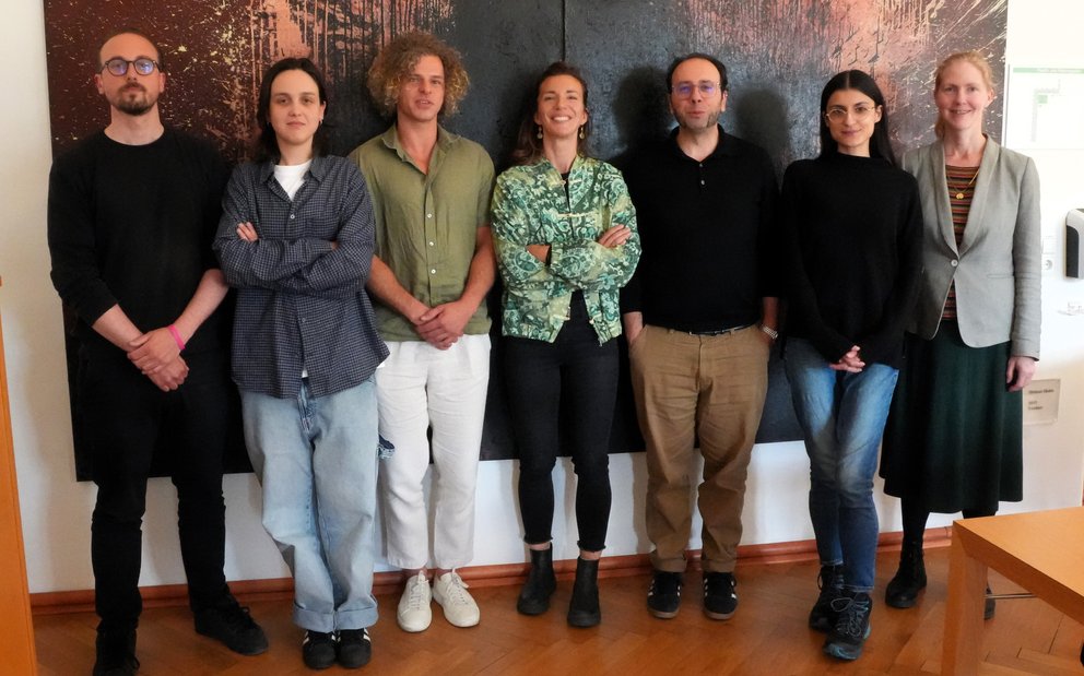 Gruppenfoto mit sieben Personen