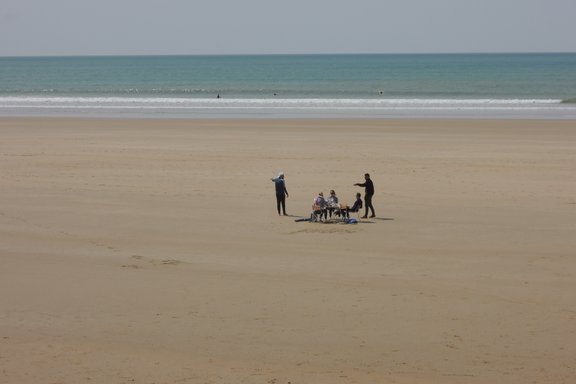Students having a picknick by the Atlantic