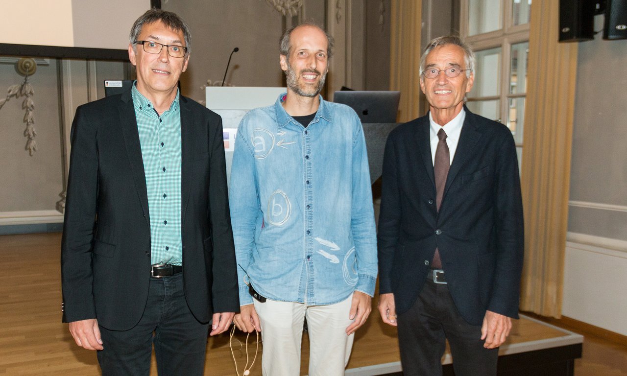 Rektor Märk und Alexander Ostermann mit Martin Hairer