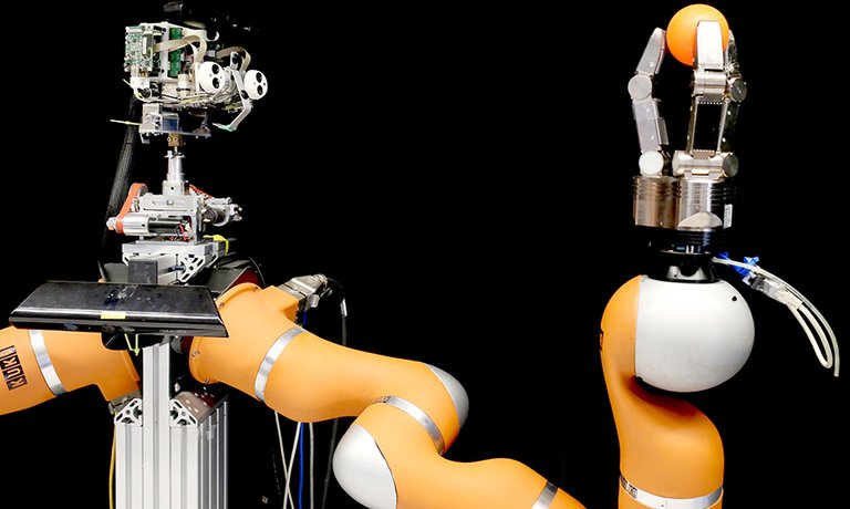 The image shows a robot arm