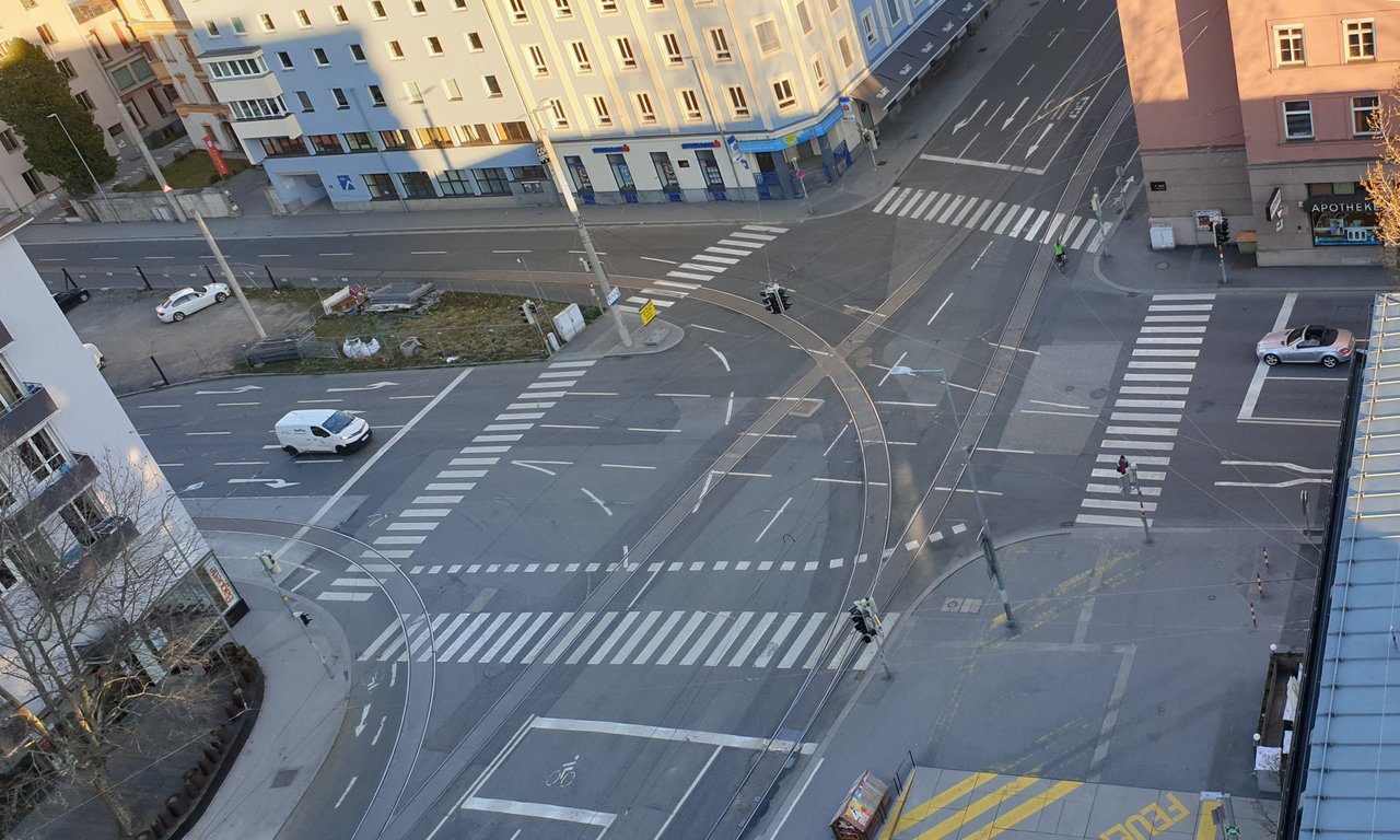 Traffic junction in Innsbruck with very few vehicles