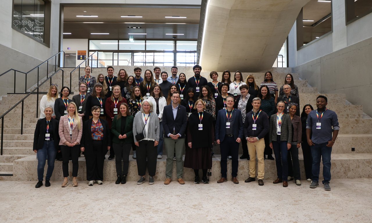 Group photo of participants from seven Aurora partner universities.