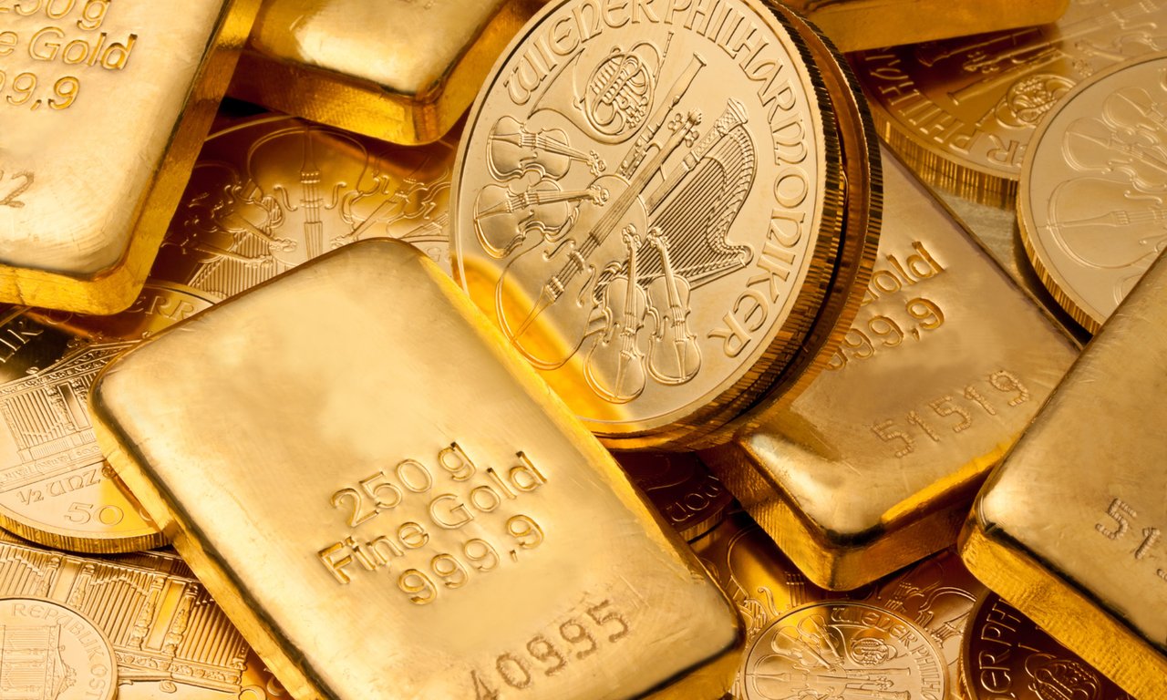 Goldmünzen und -barren