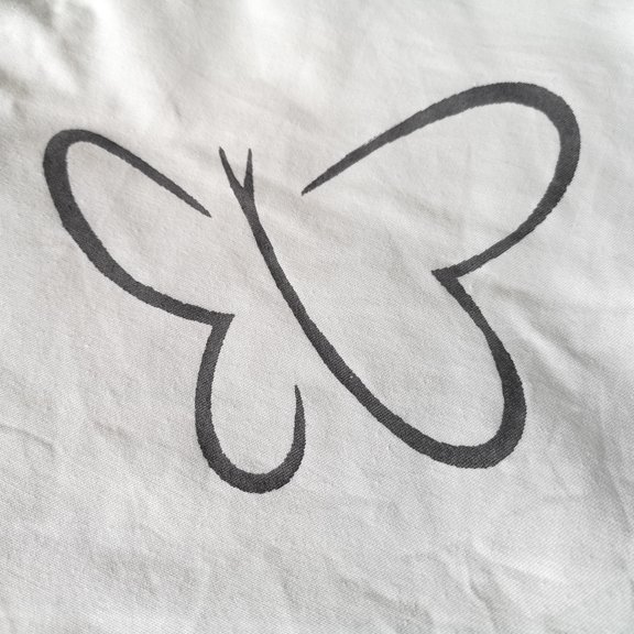 Schmetterling-Aufdruck auf einer Textilie