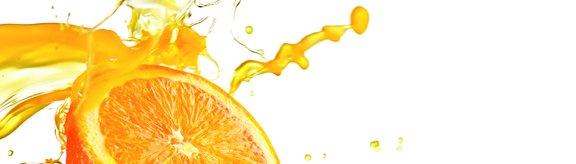 Orange mit Orangensaftspritzern