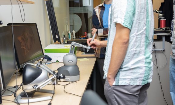 Student using a haptic device