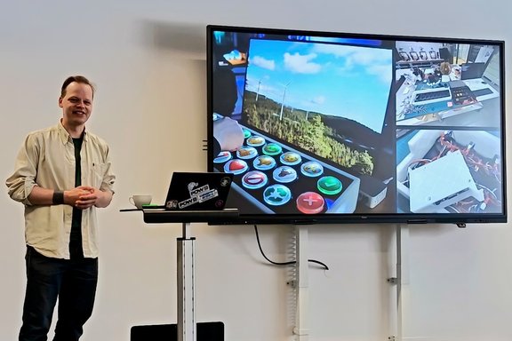 Timo Luukkonen giving a presentation