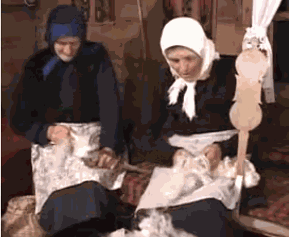 Serbia, women spinning wool